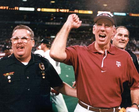 Coaches celebrating after a game