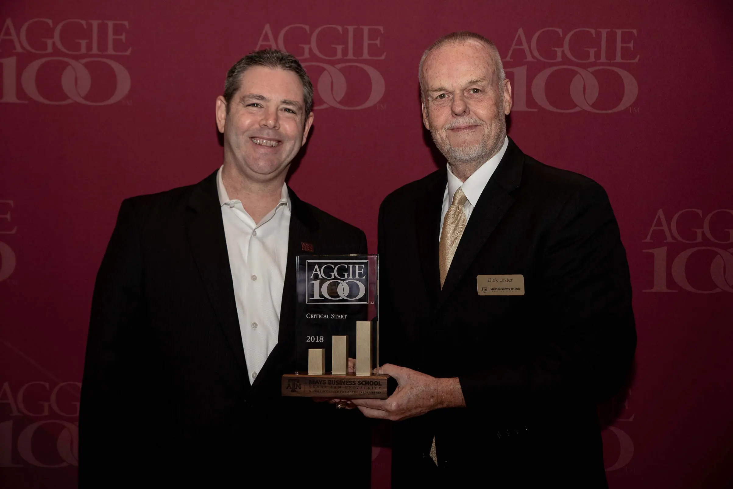 Rob Davis and Dick Lester holding a trophy