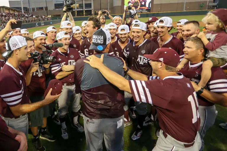 The baseball team celebrating