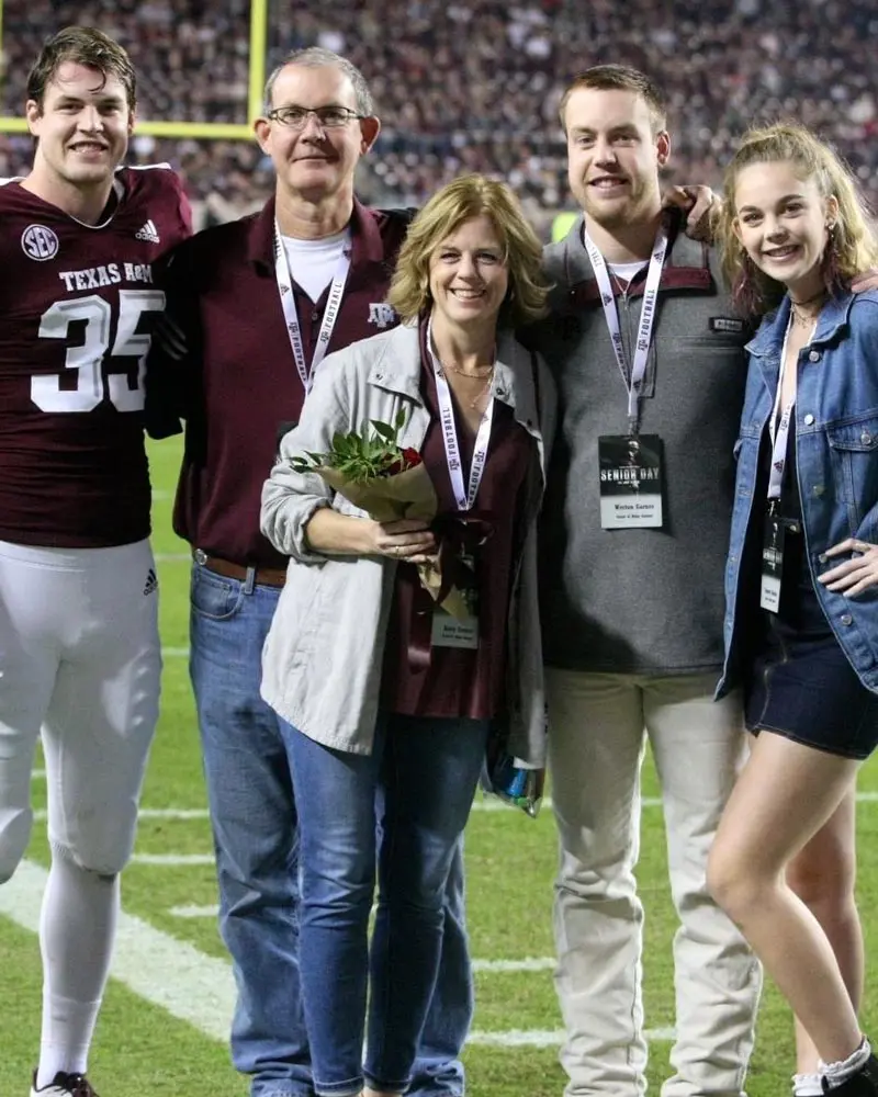 Family on field together