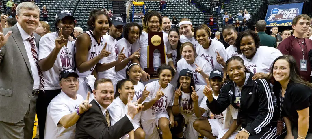 Gary Blair on the court with the women's basketball team