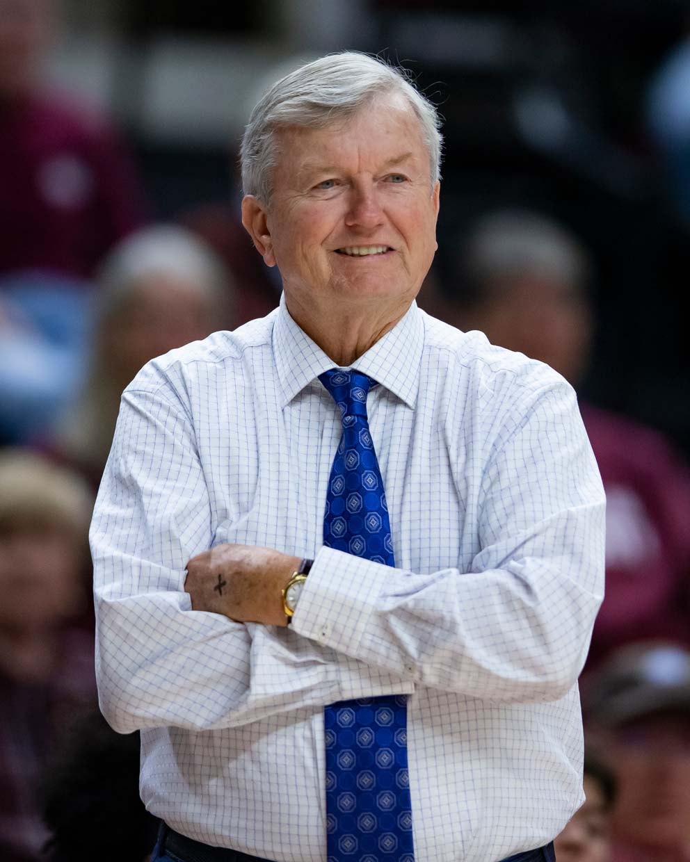 Gary Blair standing with arms crossed