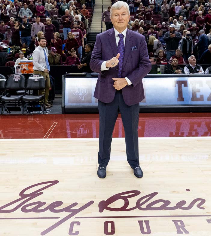 Gary Blair giving thumbs on on basketball court