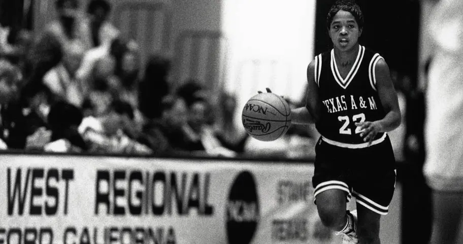 Gary Blair on the court with the women's basketball team