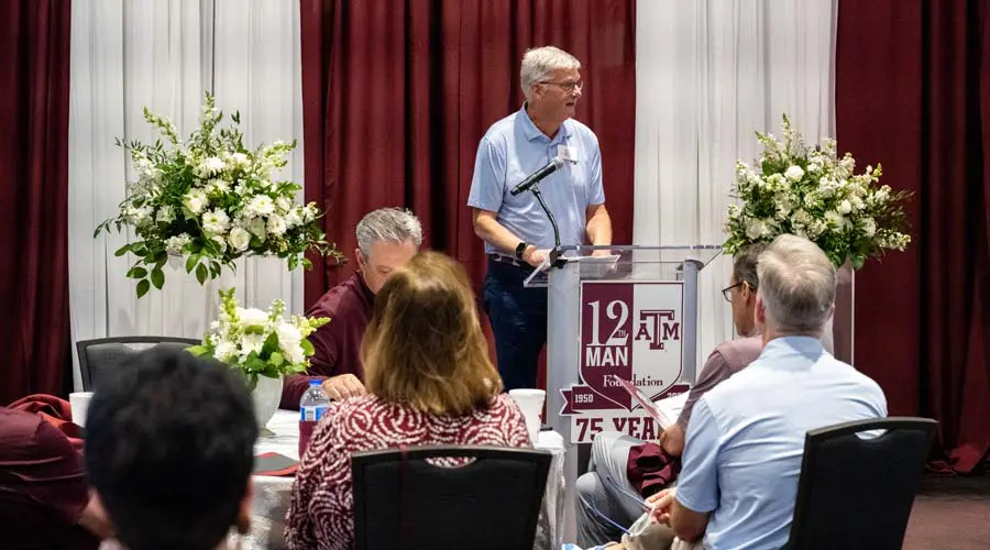 Trey Henderson speaking at an event